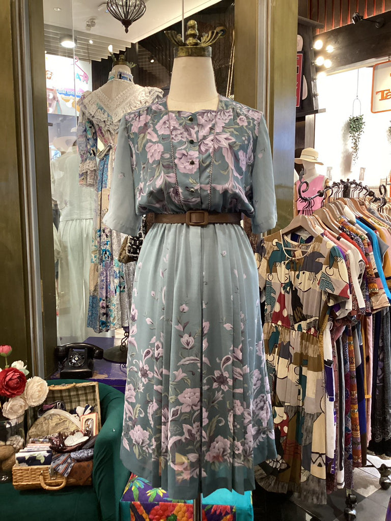Floral dress on a mannequin in a vintage clothing store