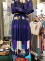 Colorful dress with geometric pattern in a store setting