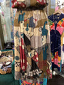 Colorful dress with abstract patterns in a store setting