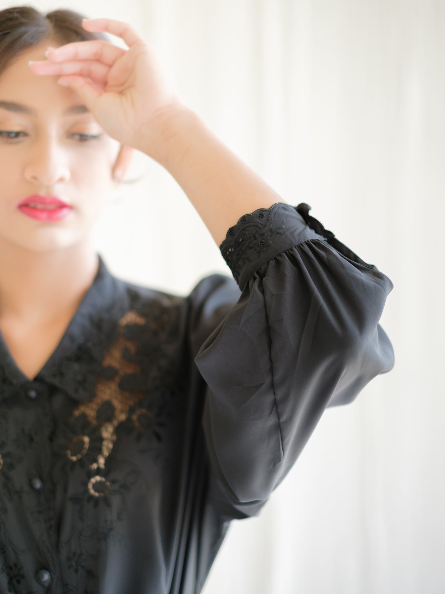 Black embroidered silk blouse